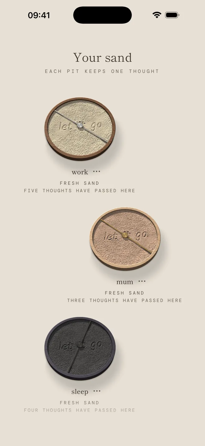 Sand pits named work, home and sleep, each with its own tray